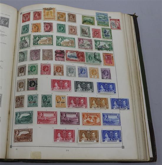 The Century Postage Stamp Album and tin of loose stamps